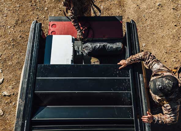 A closeup view of the secondary cover hinge.